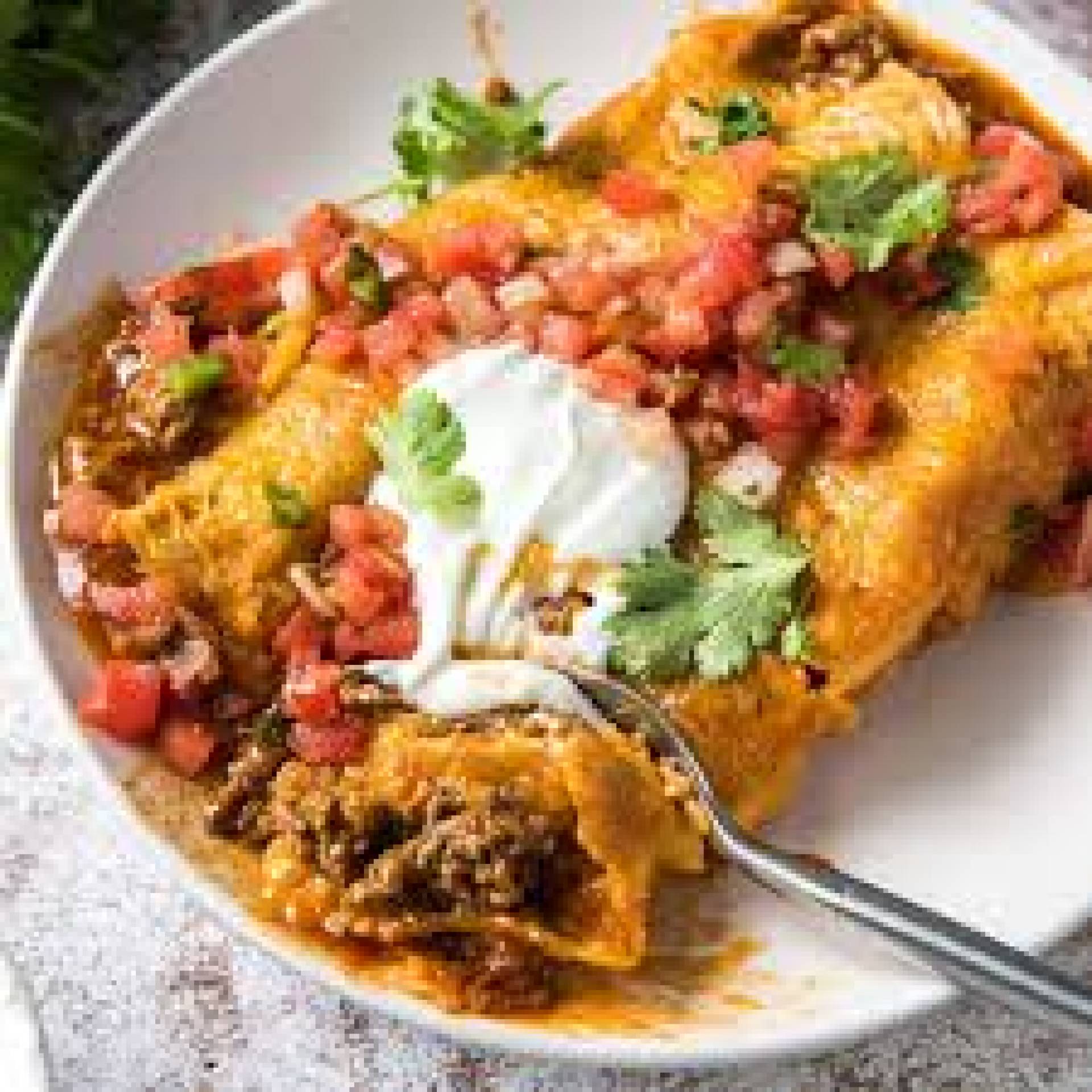 Beef Picadillo Enchiladas, Kale Slaw, Black Beans